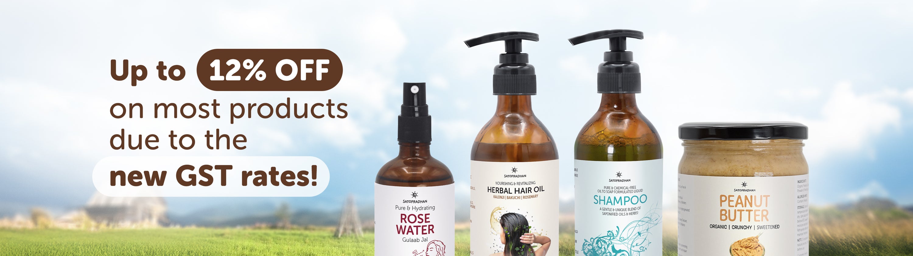 Cosmetic products with a promotional banner for GST rate changes on a scenic background