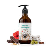 Satopradhan Herbal Shampoo in an amber pump bottle with coconut, hibiscus, soapnut and other botanical ingredients, highlighting natural herbal hair care.