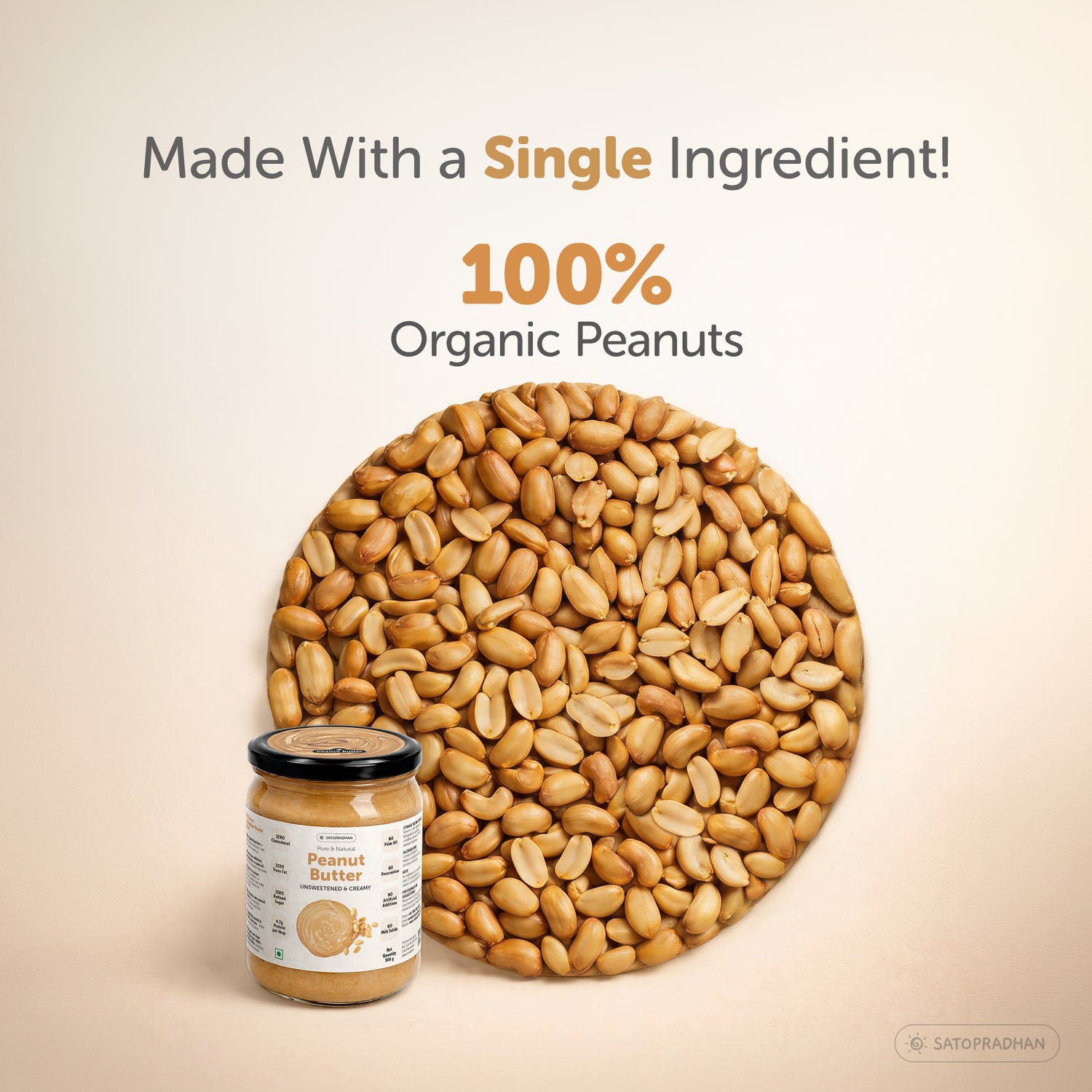 Satopradhan peanut butter made from 100% organic peanuts, displayed with a jar beside a large arrangement of peanuts.